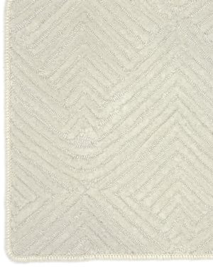 Textured neutral carpet in classic-style hallway